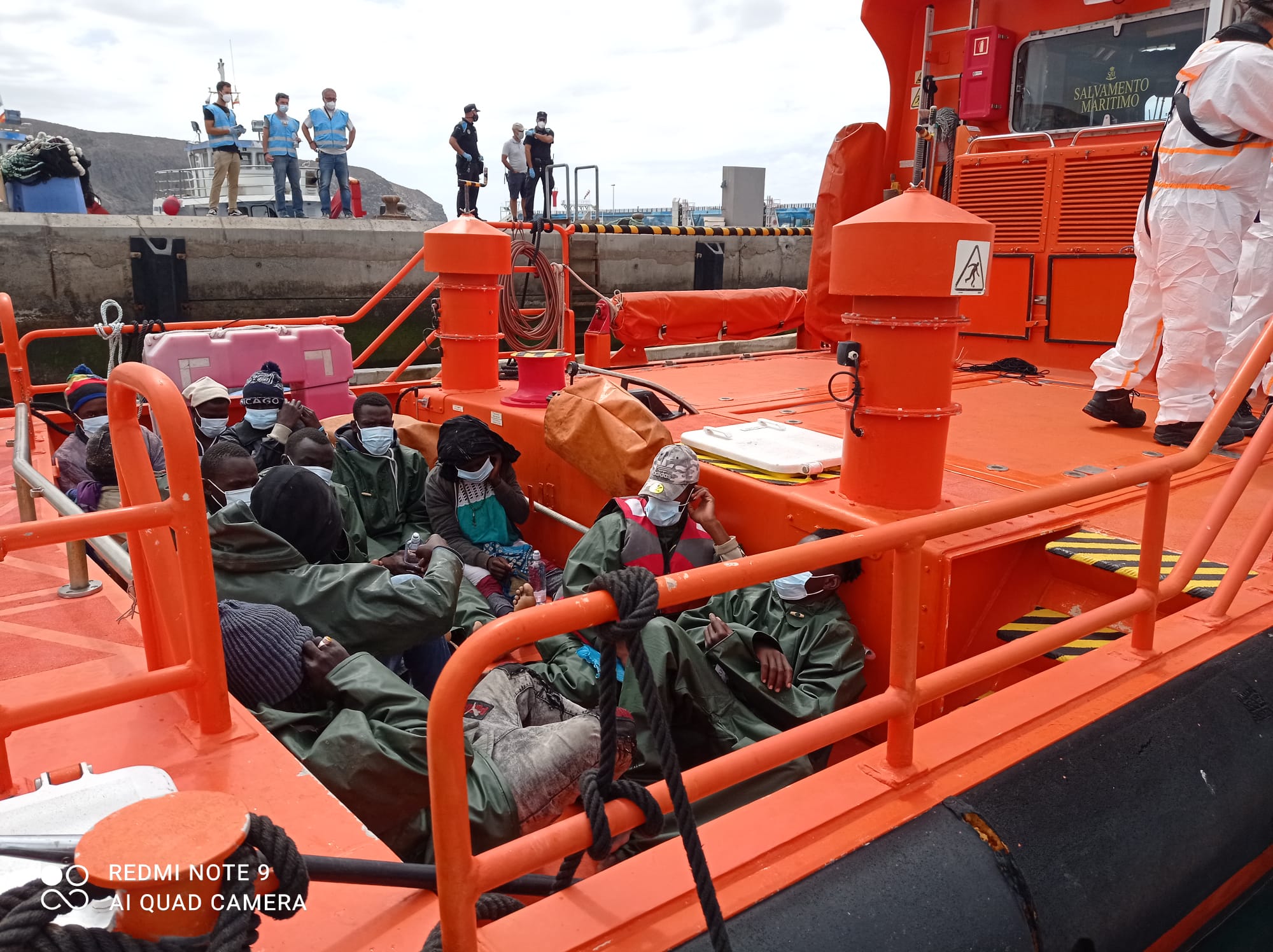 Maritime rescue retrieve sinking cayuco off coast of south of Tenerife