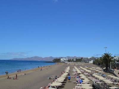 A hot sunny day in most of the Canary Islands with some scattered clouds
