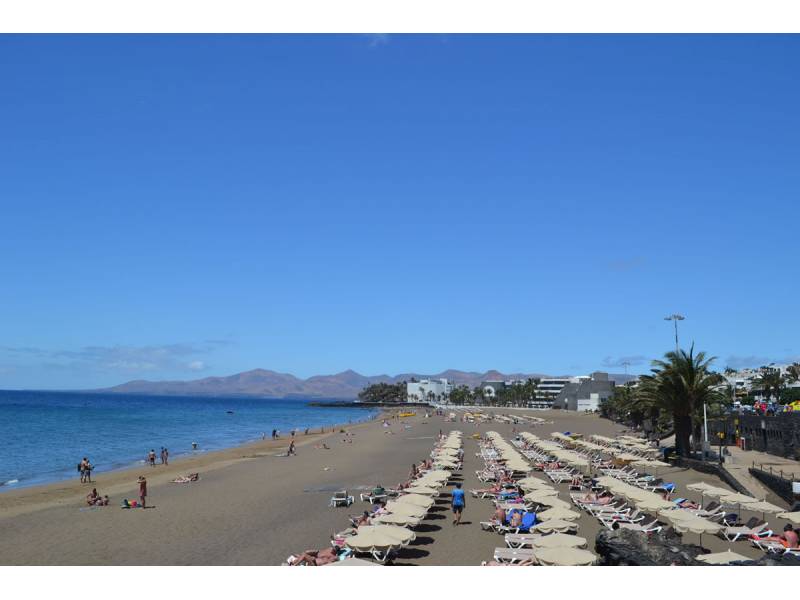 A hot sunny day in most of the Canary Islands with some scattered clouds