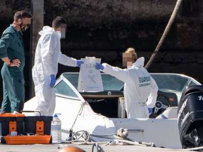Search widened for missing father and daughters as blood found on his boat