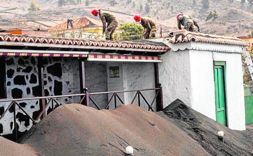 Three people hurt clearing the ash from their roofs; one is in Intensive Care