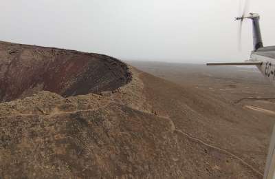 Woman rescued by helicopter after falling into the crater of a volcano