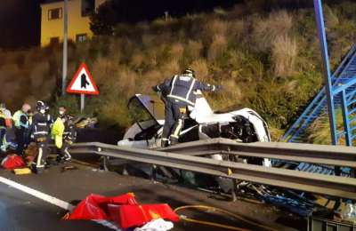 Two injured women trapped inside car after crashing off a bridge