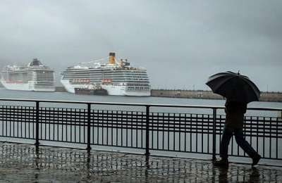 A cooler day with some showers before a wet weekend