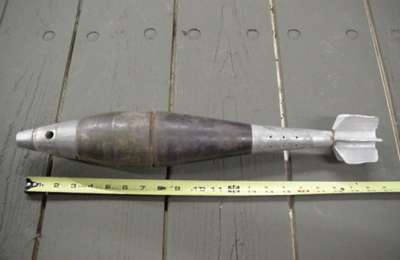 A live mortar grenade is found in a workshop being used as an ornament 