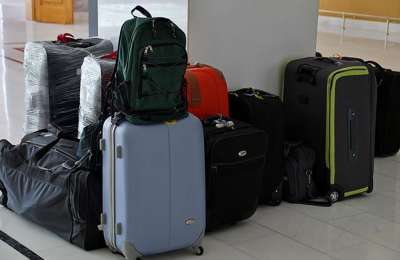 Tourist has suitcases robbed outside a hotel as she popped into reception