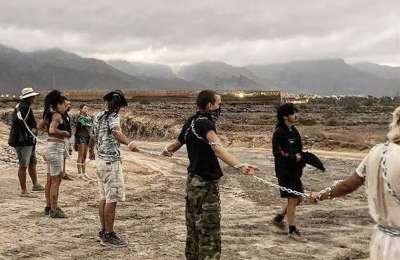 El Puertito activists chain themselves together and stop construction work