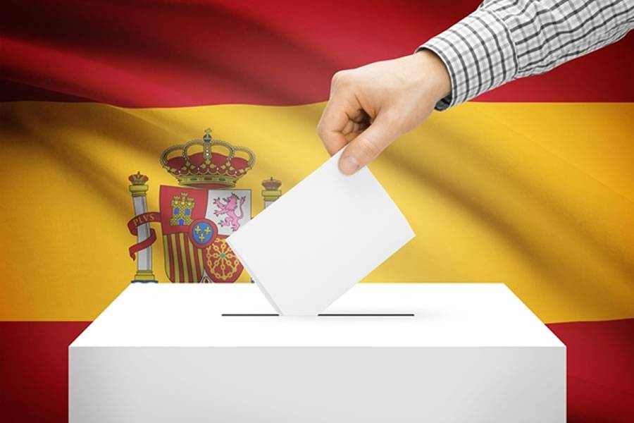 What do I need to do to vote in the local elections in Spain? 