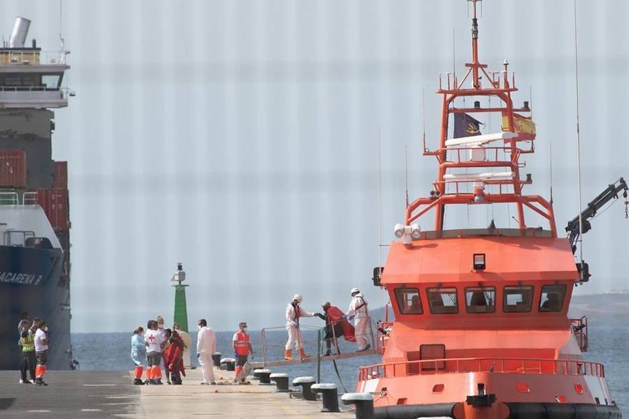57 adults and 4 children rescued in a small inflatable boat off coast of the Canary Islands