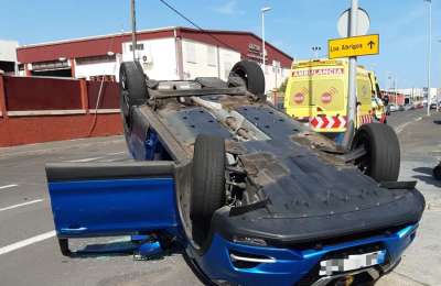 Driver injured as car is flipped by someone reversing the wrong way out of a one-way street