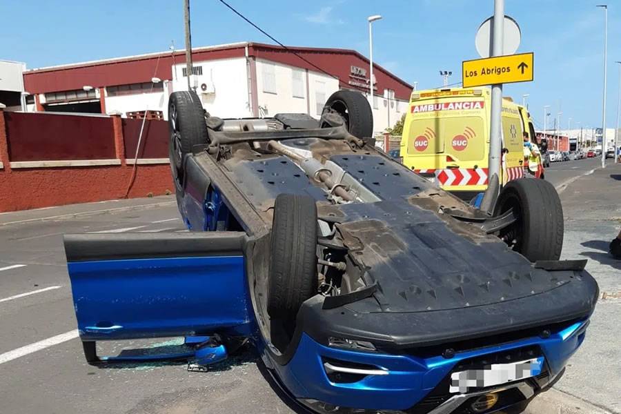 Driver injured as car is flipped by someone reversing the wrong way out of a one-way street
