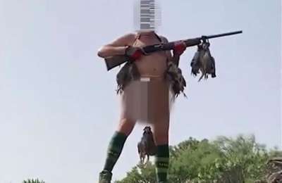 VIDEO: Canarian hunter videos himself naked with a pheasant hanging from his genitals