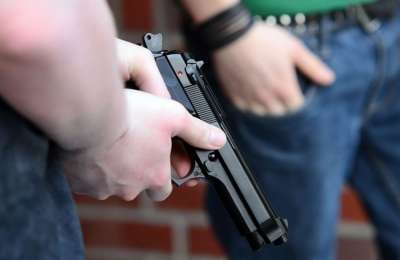 Two men arrested after one accidentally shot himself in the penis