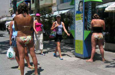New fines for walking around with no top on or hanging clothes over balconies
