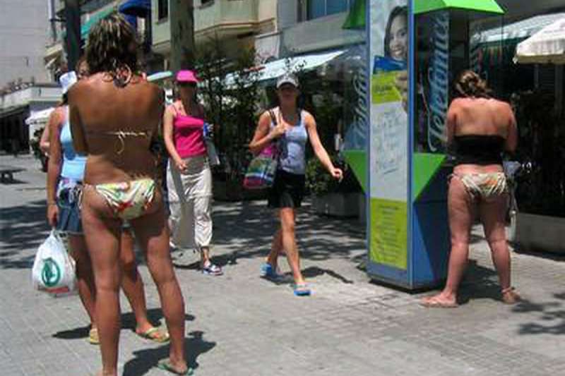 New fines for walking around with no top on or hanging clothes over balconies