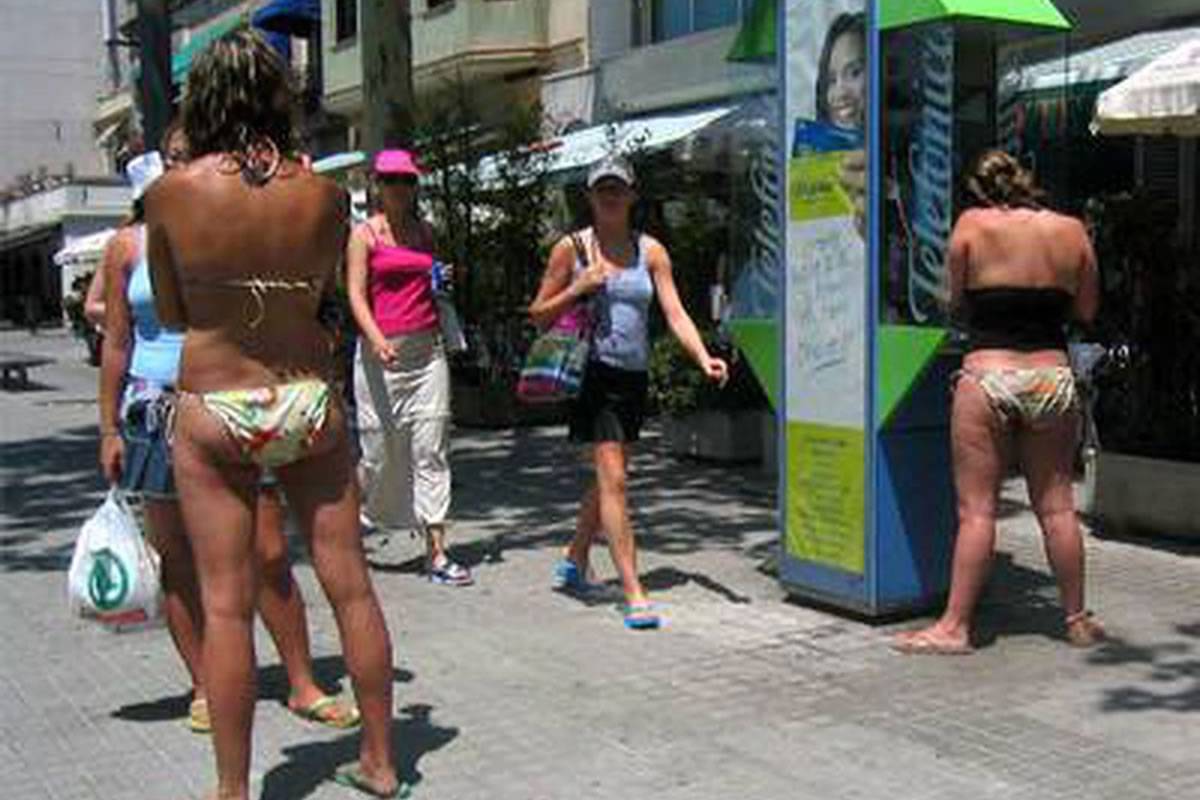 New fines for walking around with no top on or hanging clothes over balconies