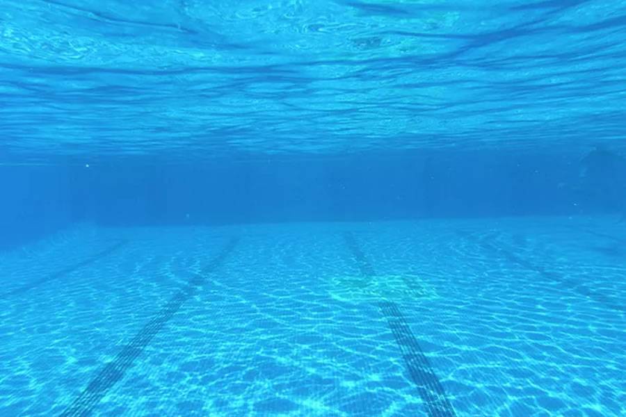 A dead body is found by hotel guests floating in a swimming pool