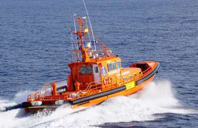 A castaway is rescued clinging to an oil drum on the high seas near the Canary Islands