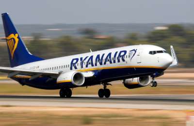 Police meet Ryanair flight from the UK at Tenerife south airport after trouble on board