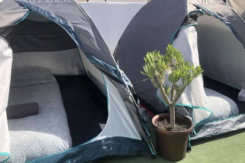 A man sets up tents on his roof terrace in Lanzarote and rents them out on Airbnb