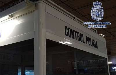 A tourist is revived by police officers at Tenerife South airport