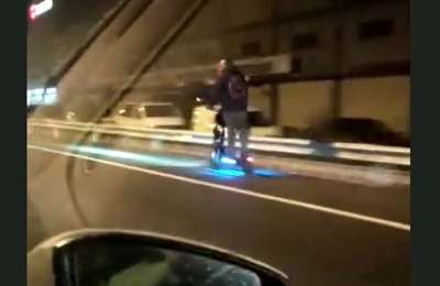 Man videoed doing 80kmh along motorway on an electric scooter