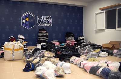 VIDEO: Police raid a workshop printing and embroidering counterfeit items