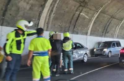 Motorcyclist injured in a collision with a car in a tunnel 