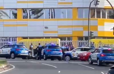 Five police cars chase a motorist through the streets of Las Palmas
