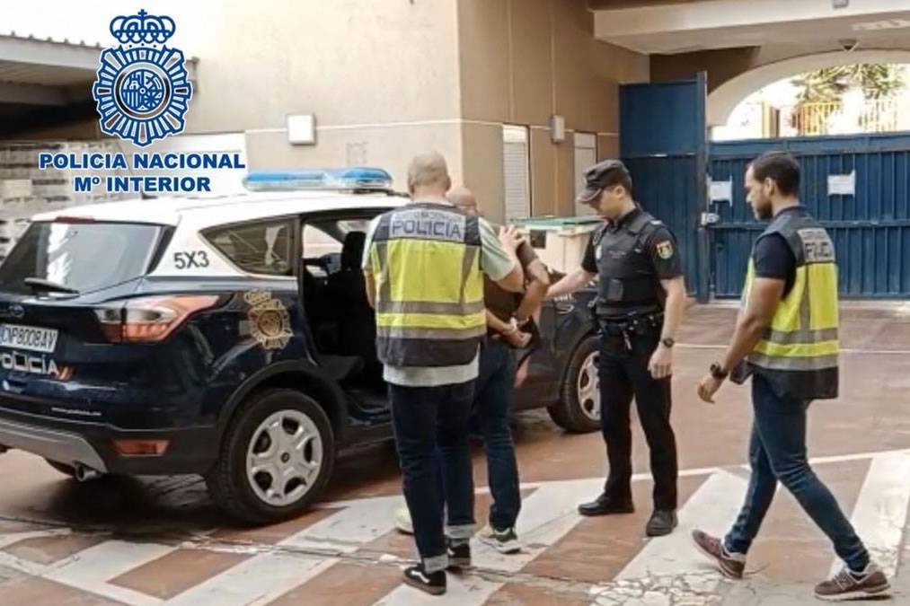 A man is arrested for setting fire to 27 vehicles including a police van