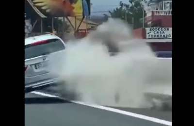 VIDEO: Car hits motorway barrier and carries on as if nothing had happened