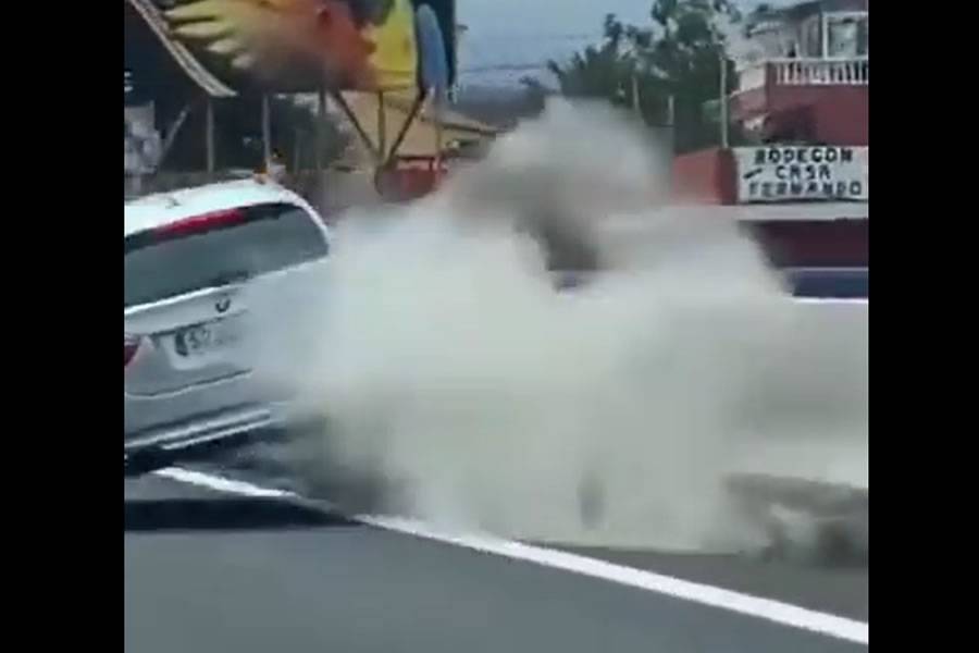 VIDEO: Car hits motorway barrier and carries on as if nothing had happened