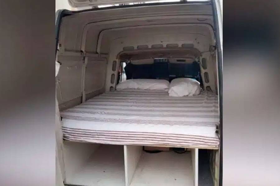 A small van with a mattress is offered as a holiday let for 40 euros a day