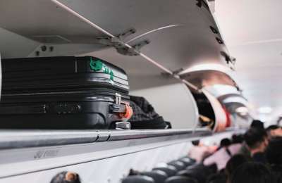 Airlines face fines for charging passengers for hand luggage and seats