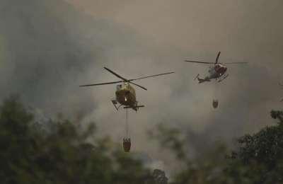 SATURDAY:helicopters and seaplanes have dropped over 2.7 million litres of water on the fire in Tenerife