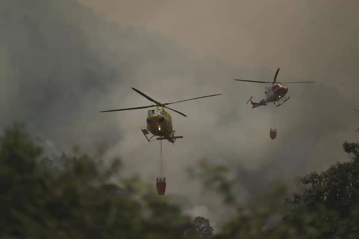 SATURDAY:helicopters and seaplanes have dropped over 2.7 million litres of water on the fire in Tenerife