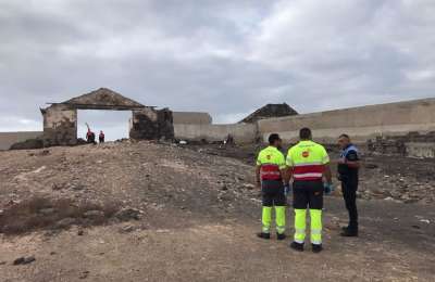 Decomposed body of a man found under rubble of a collapsed wall in La Rocar