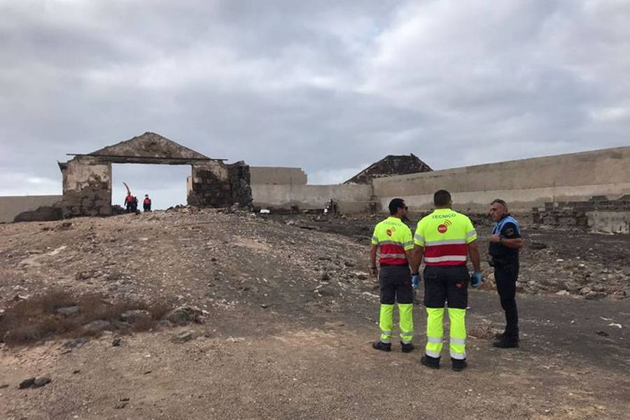Decomposed body of a man found under rubble of a collapsed wall in La Rocar