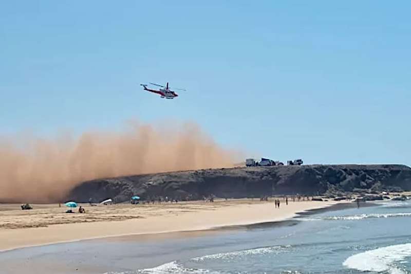 Helicopter airlifts injured person from Jurago Beach after suffering from drowning