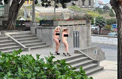 Two women in heels decide to strip off and go for a walk in Arucas