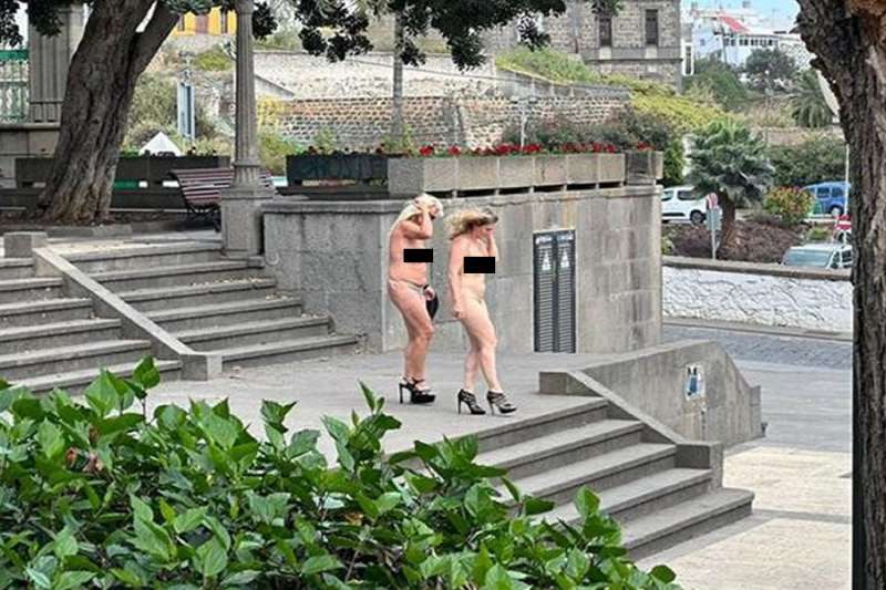 Two women in heels decide to strip off and go for a walk in Arucas