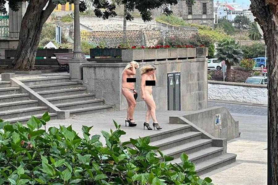 Two women in heels decide to strip off and go for a walk in Arucas