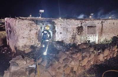 Fire brigade tackle blaze at an abandoned building on Playa Blanca Pier