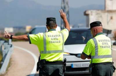 Two men arrested for riding a motorbike without a license and carrying cocaine