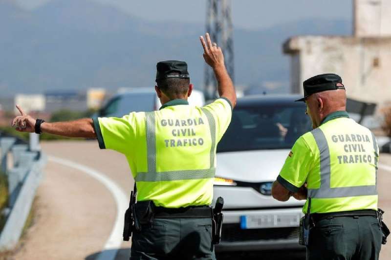 Two men arrested for riding a motorbike without a license and carrying cocaine