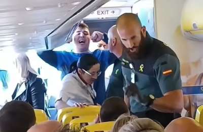 VIDEO: Fight erupts between two "drunken" Scots on Tenerife-bound flight