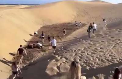 Outrage as influencer hides €1,000 prize in sand dunes and followers dig it up