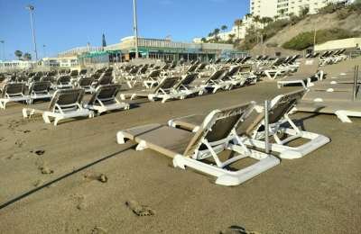 The sand continues to bury the sunbeds on Playa del Ingles beach