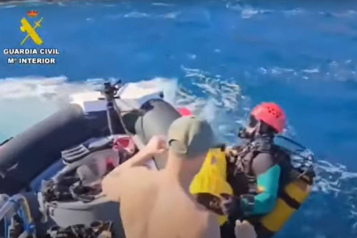 Divers investigate a sea cave as search continues for the two missing teenagers
