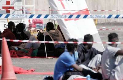 Tents are being installed at ports in the Canary Islands to accommodate migrant minors